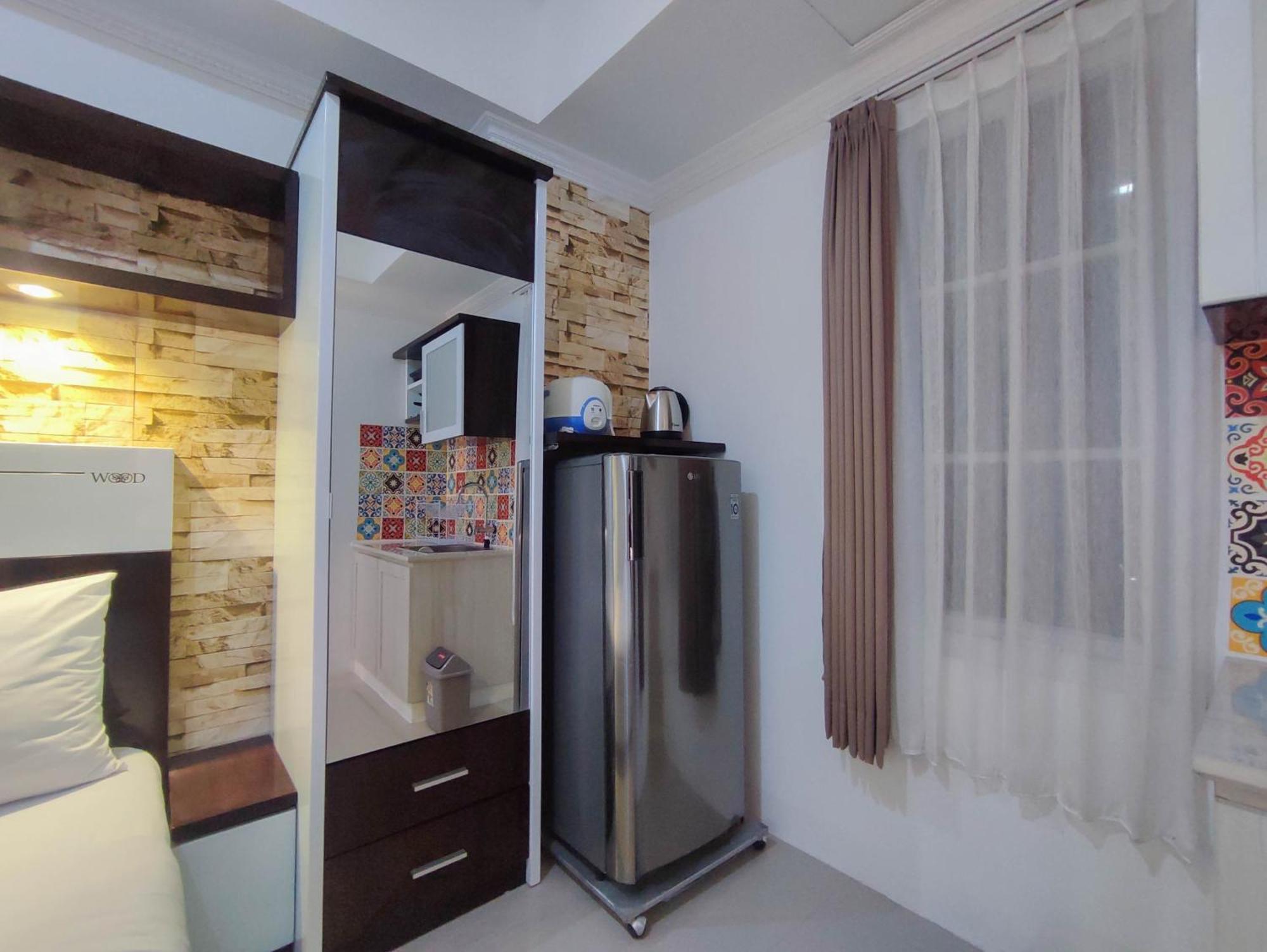 Apartemen Simple And Homey At Paltrow By Travelio
